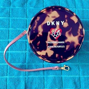 DKNY wristlet, save the turtles. In Excellent Condition.